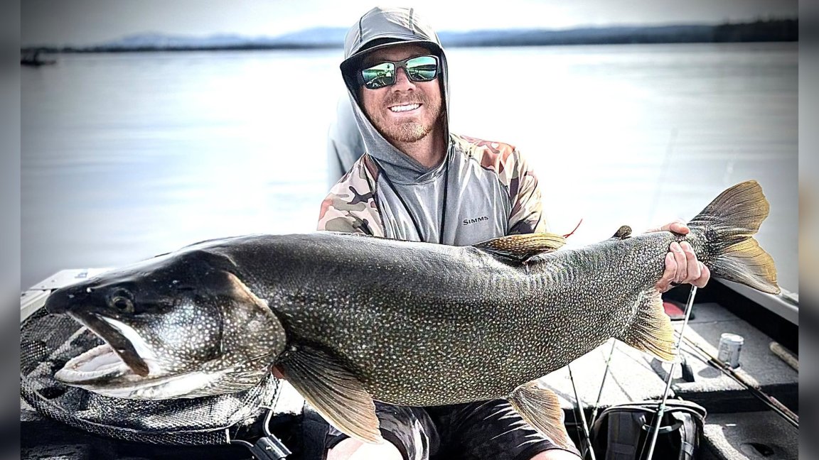 An Idaho fisherman with a state-record lake trout.