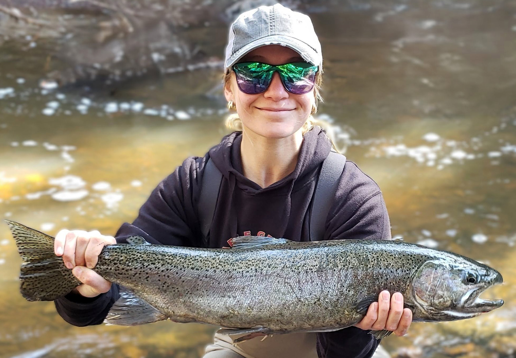 Angler Unseats Her Sister's Steelhead Record While Fishing