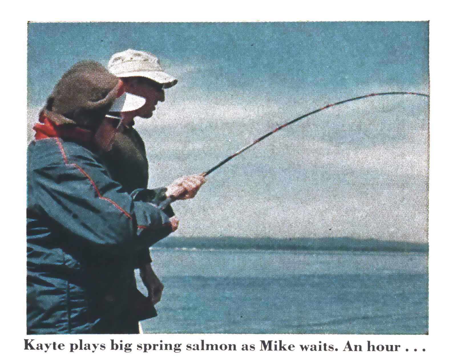 A vintage color film photo of a woman hooking into a salmon.