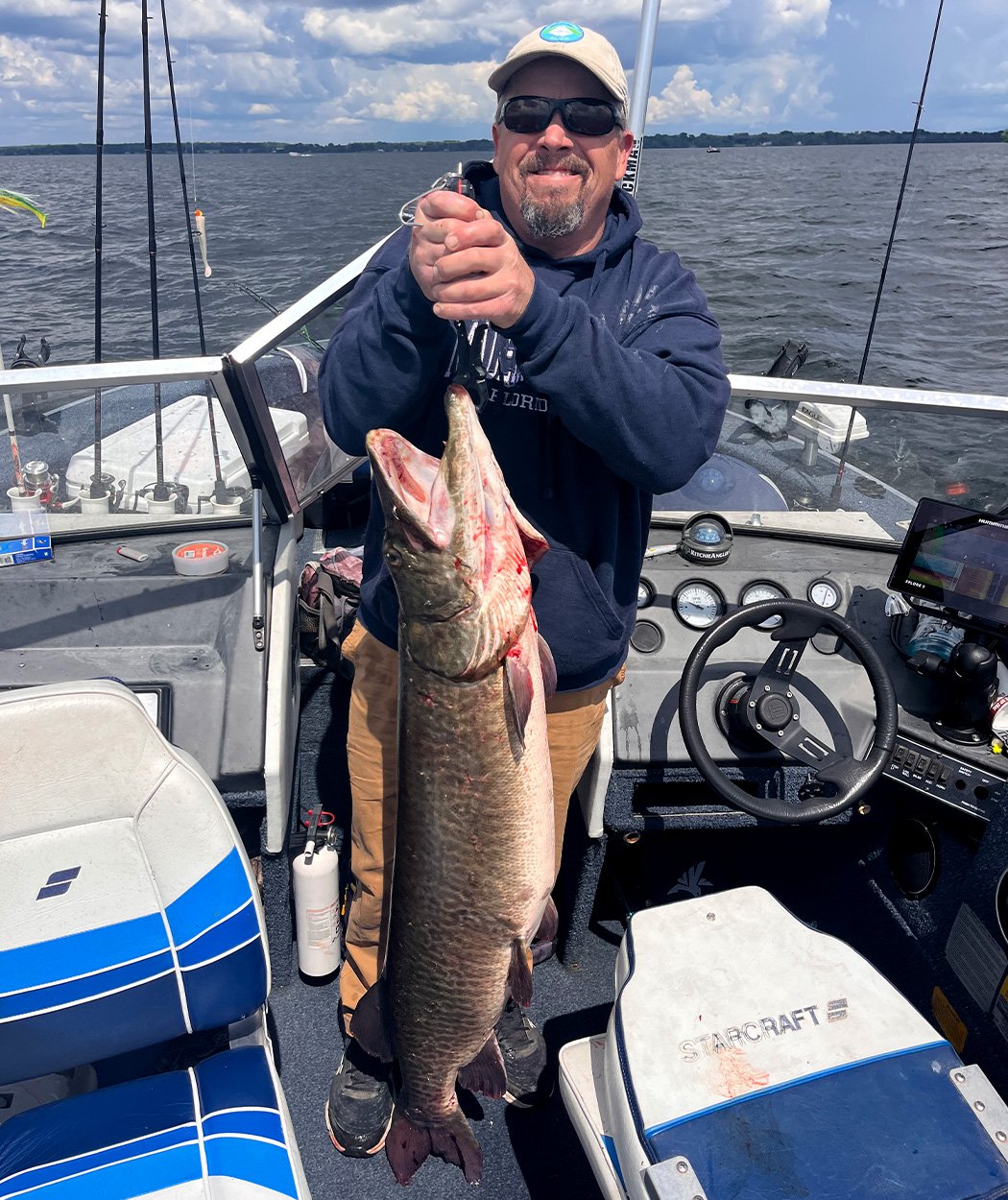 An angler with a big Vermont muskie.