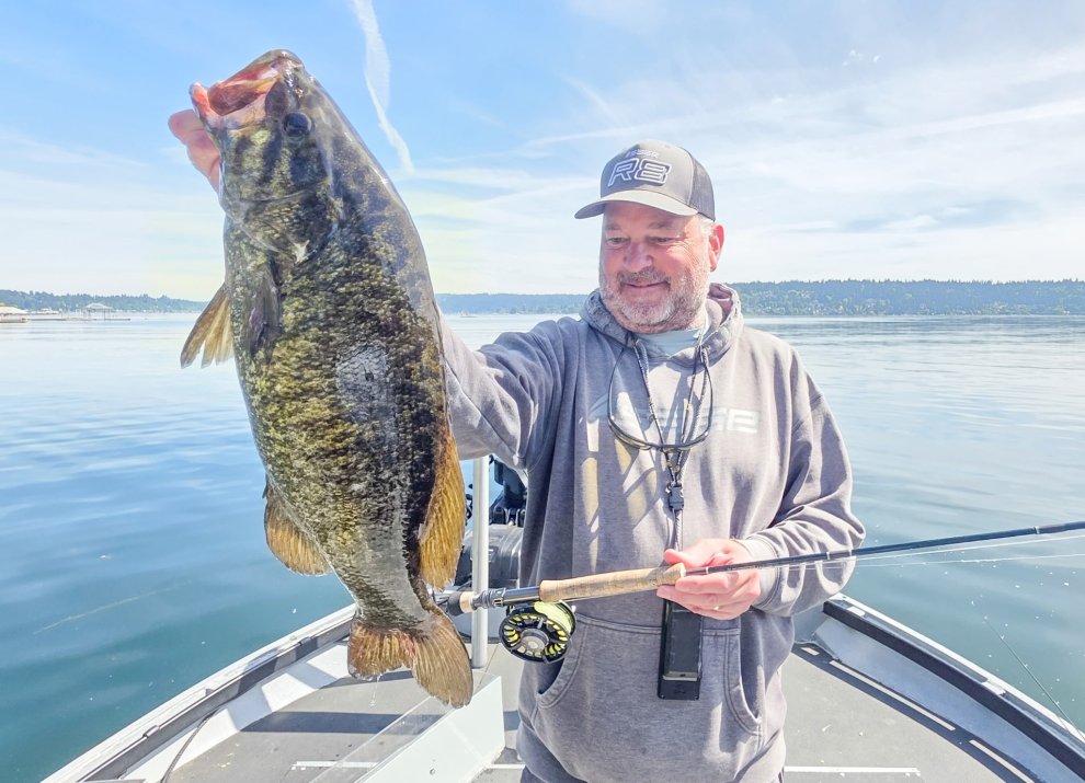 Fly Fishing Guide Catches the Same Giant Smallmouth Bass 3 Times — It Turned Out to Be a World Record