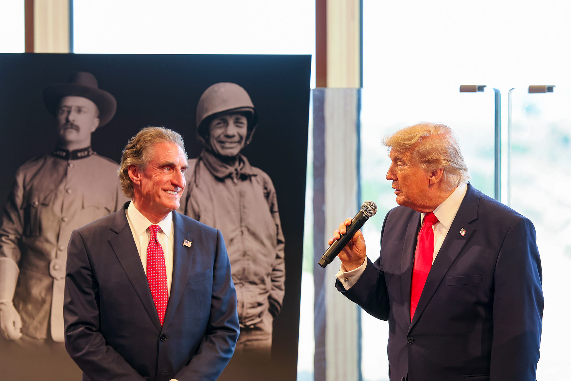MEDORA, NORTH DAKOTA - JULY 01: (L-R) Doug Burgum and Donald Trump speak during the Inaugural Events Of The Theodore Roosevelt Presidential Library on July 01, 2026 in Medora, North Dakota. (Photo by Tasos Katopodis/Getty Images for Theodore Roosevelt Presidential Library)