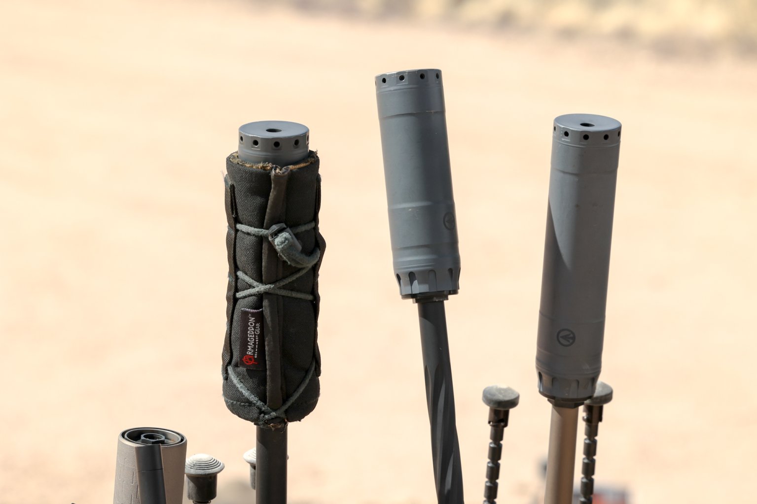 Suppressors on rifles.