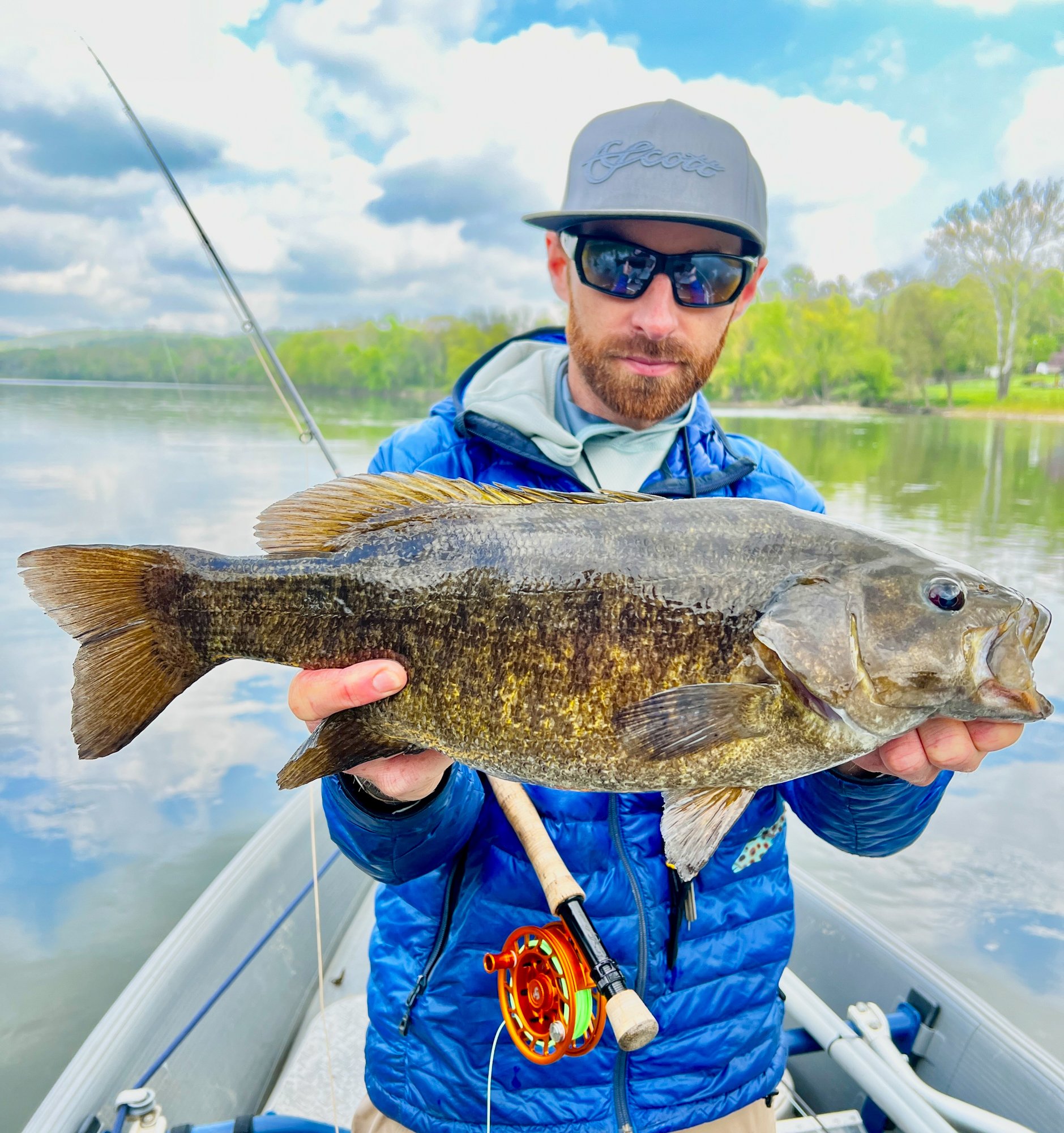 Jake Villwock holds up a nice river smallmouth