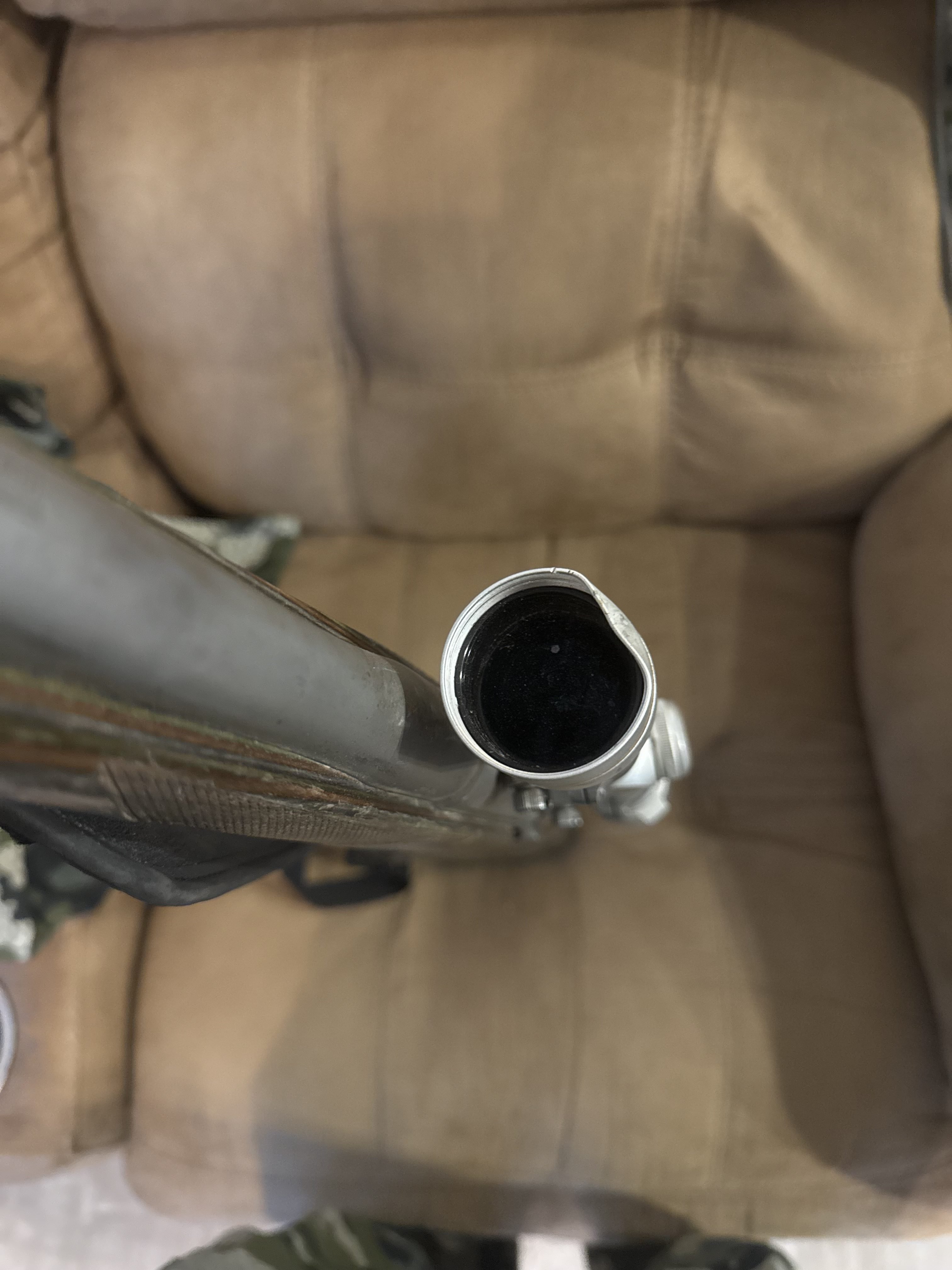 dented rifle scope