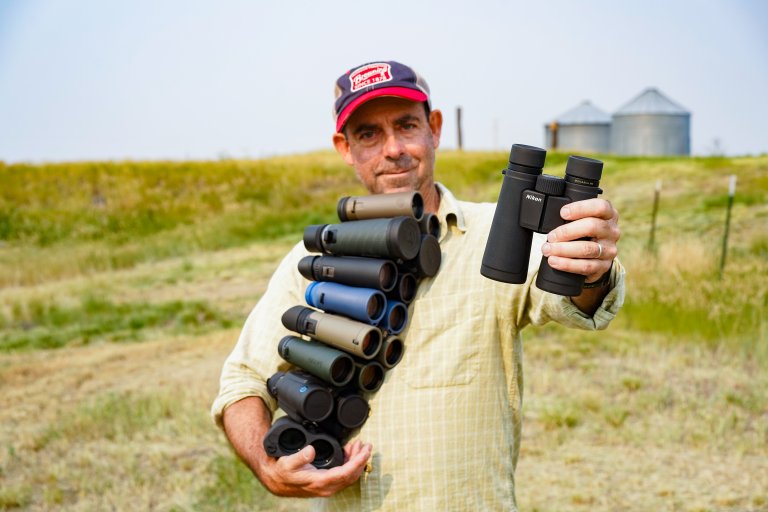 The author holding the best binoculars of 2026