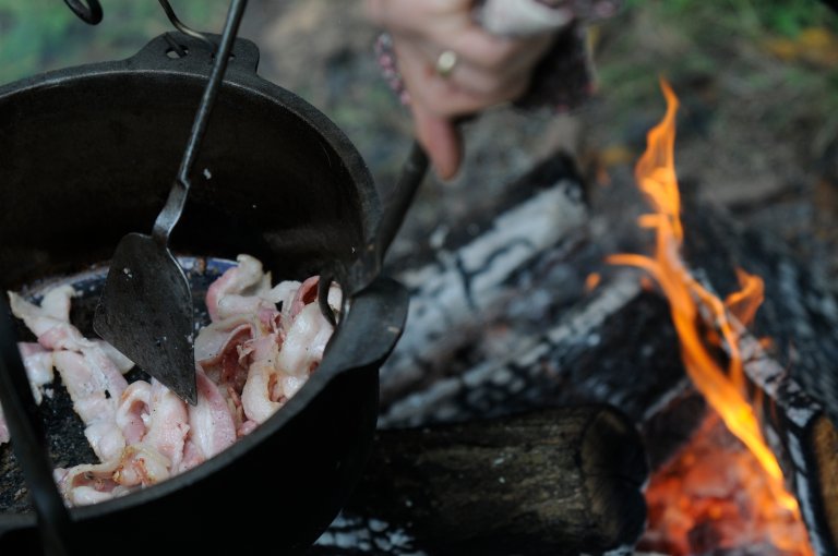 Bacon is cooked in a Dutch oven over a fire in preparation for a chowder.Old Dry Road Farm in Lower Heidelberg welcomes over 800 people to their annual harvest festival.Photo by Jeremy Drey9/23/2012 (Photo By Jeremy Drey/MediaNews Group/Reading Eagle via Getty Images)