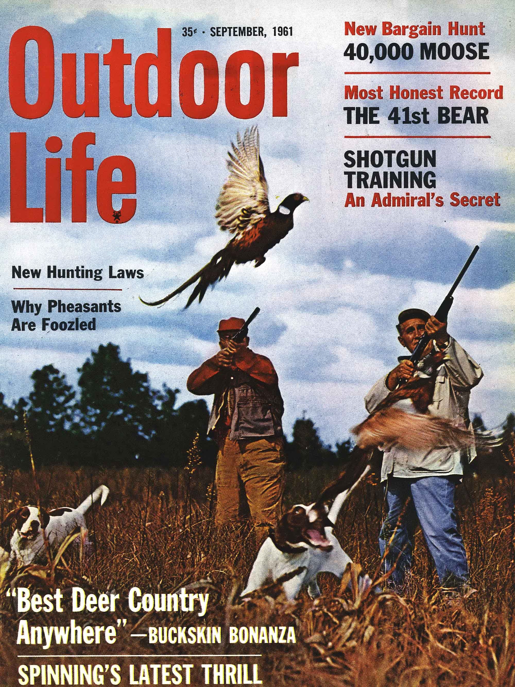 An old outdoor life cover with hunters and a pheasant