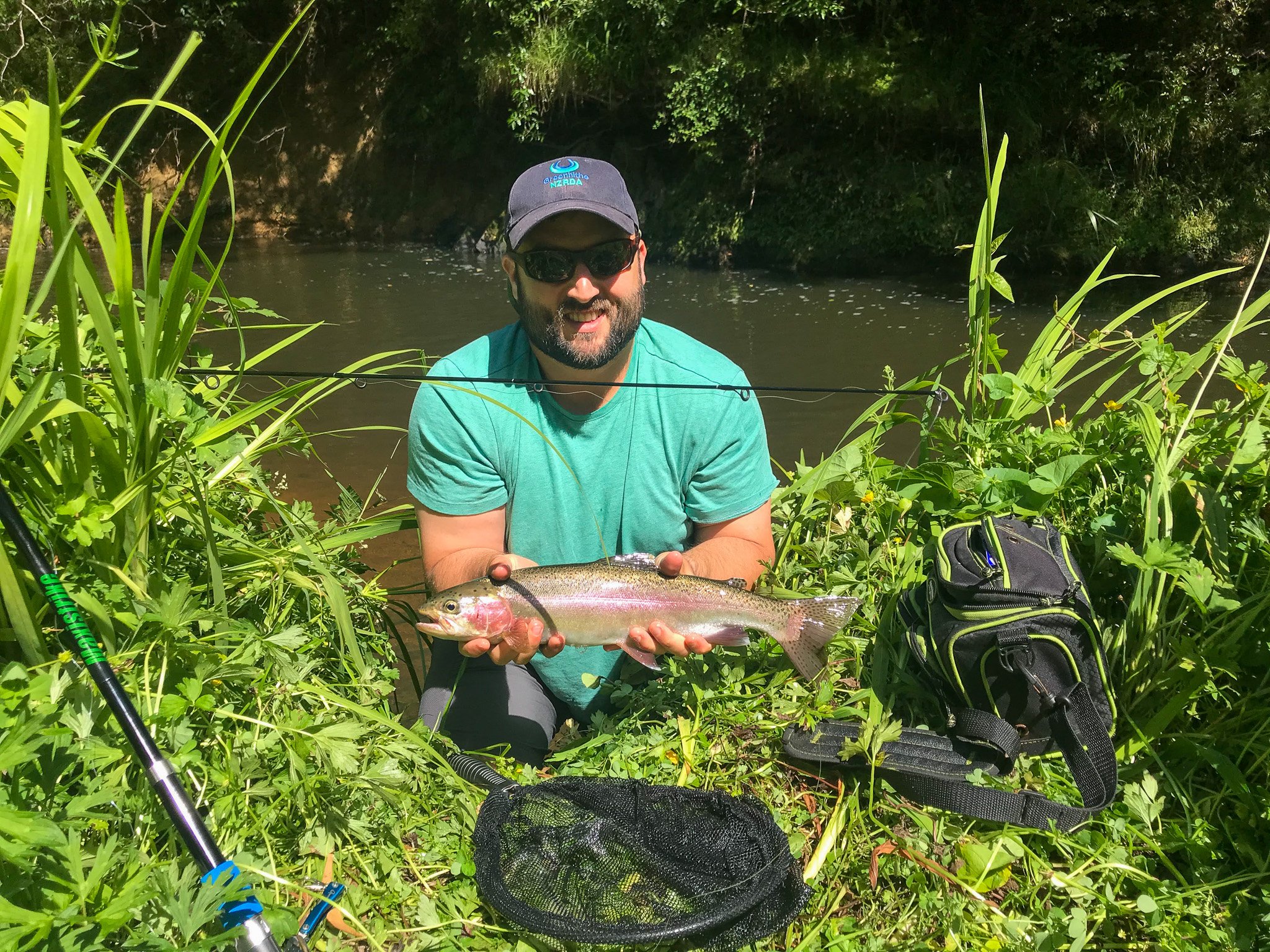 Adam Schellhammer of American Rivers holds up a nice trout.
